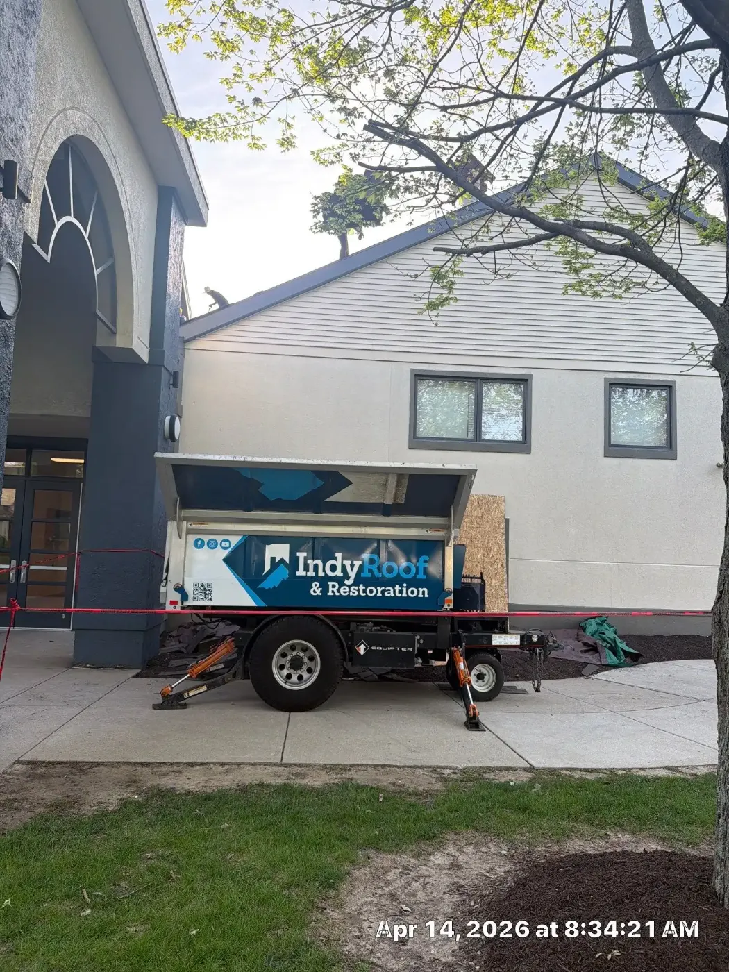 Tarping and dry-in on a Covington commercial roof